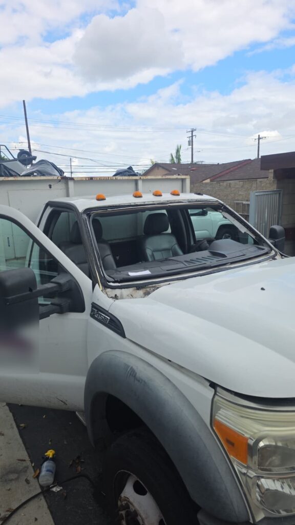 Ford F-450 with the old windshield removed and the frame prepped for new glass by a Reyes Glass Group technician